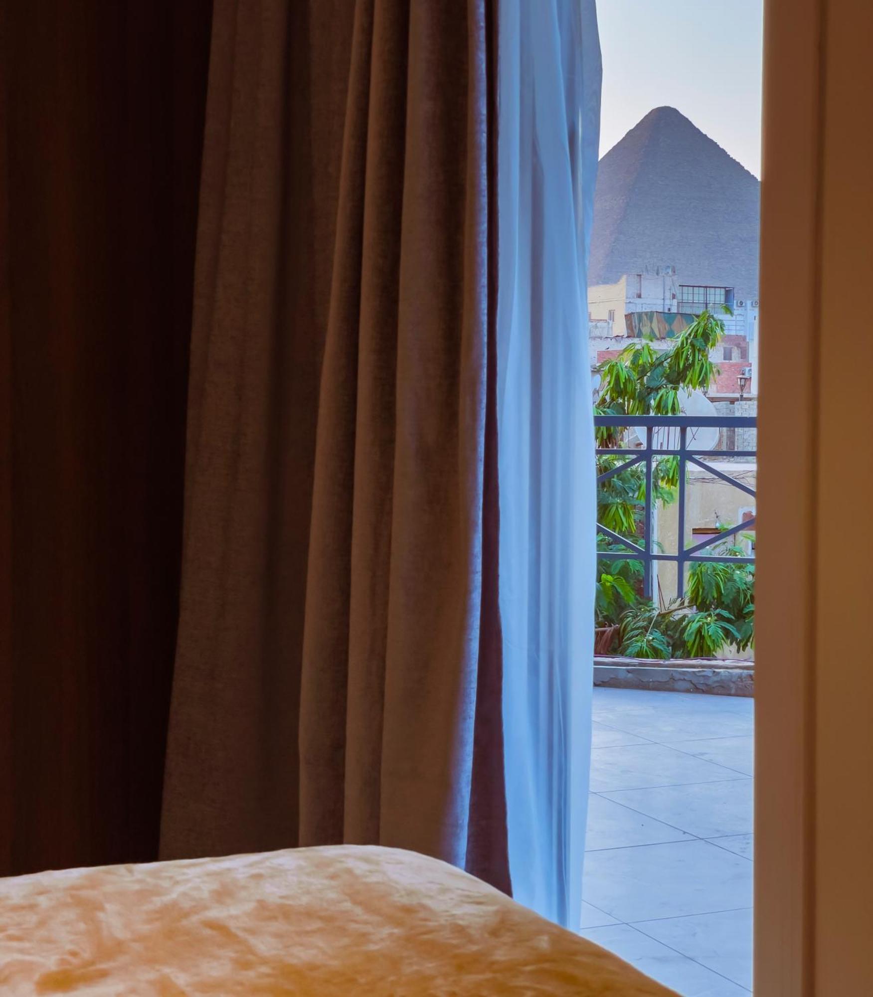 Kafret el-Gabal King Khufu Pyramids View Hotel חדר תמונה