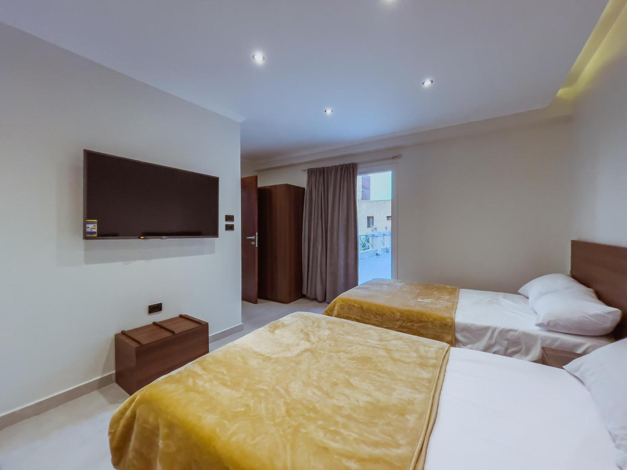 Kafret el-Gabal King Khufu Pyramids View Hotel חדר תמונה