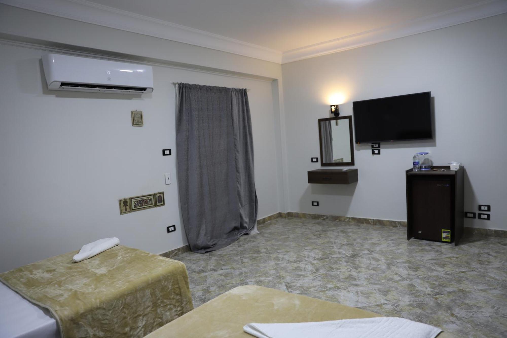 Kafret el-Gabal King Khufu Pyramids View Hotel חדר תמונה