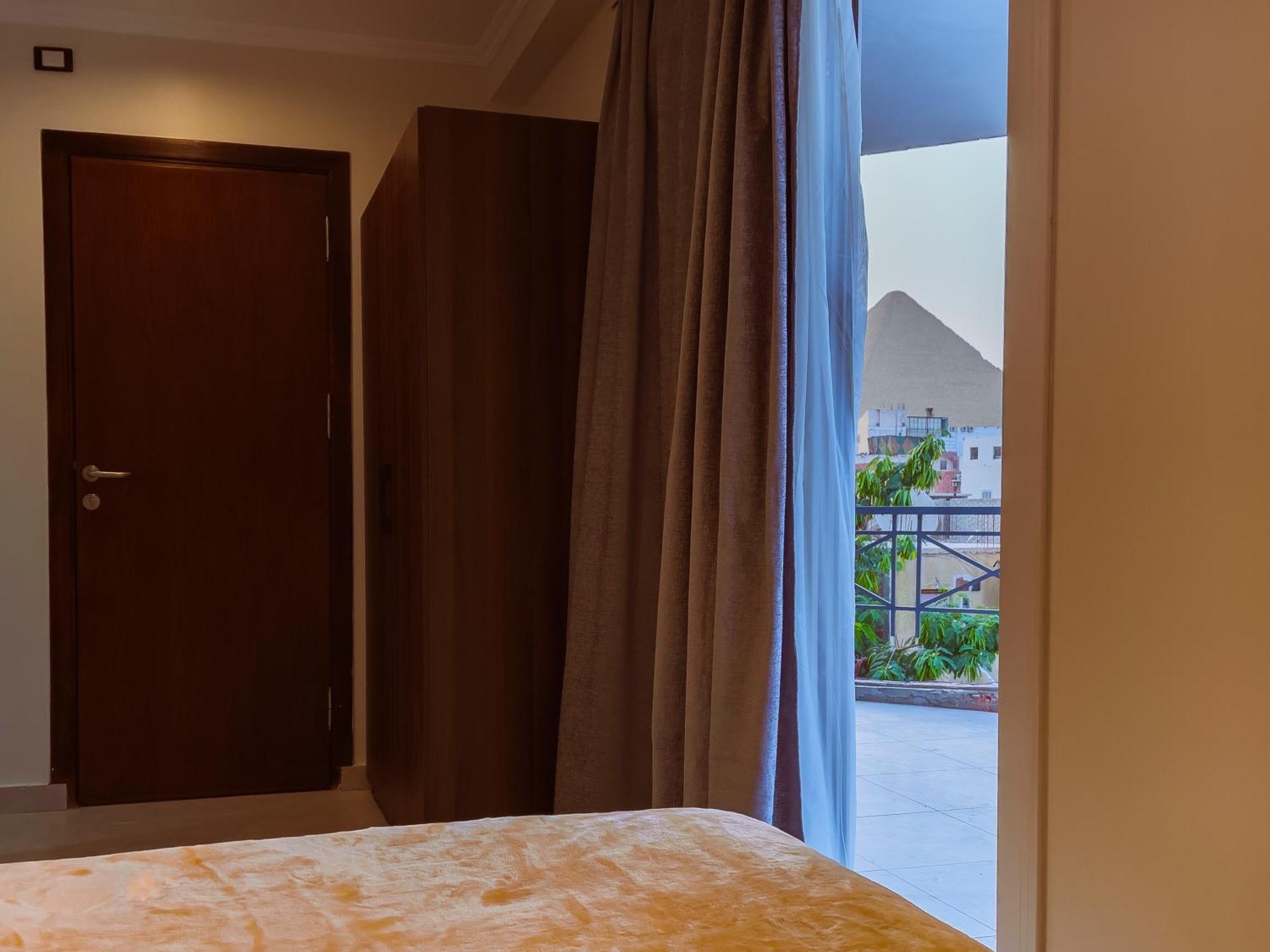 Kafret el-Gabal King Khufu Pyramids View Hotel חדר תמונה